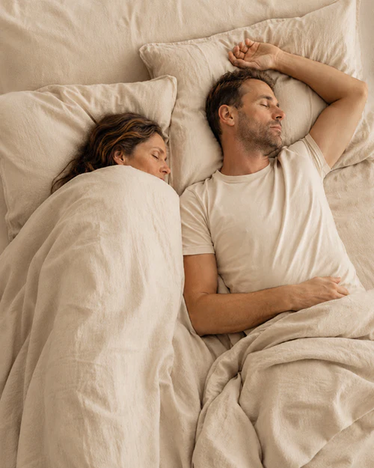 Par som sover i samme seng med hver sin temperatur